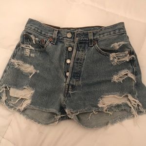 Levi 501 high waisted distressed shorts